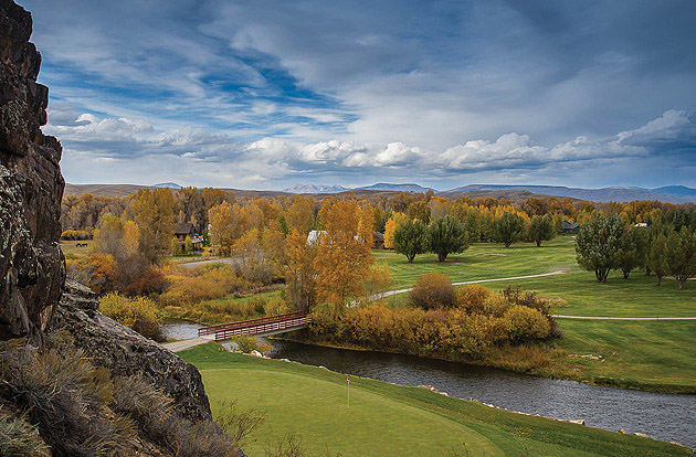 The 13th green at Dos Rios Golf Club squeezes between the Gunnison River and Hartman Rocks.