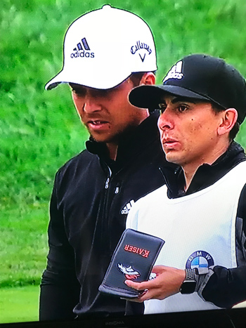 BRONCOS FAN: Caddie Austin Kaiser (right) with Xander Schauffele