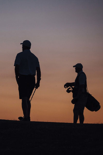 Ballyneal caddies walking